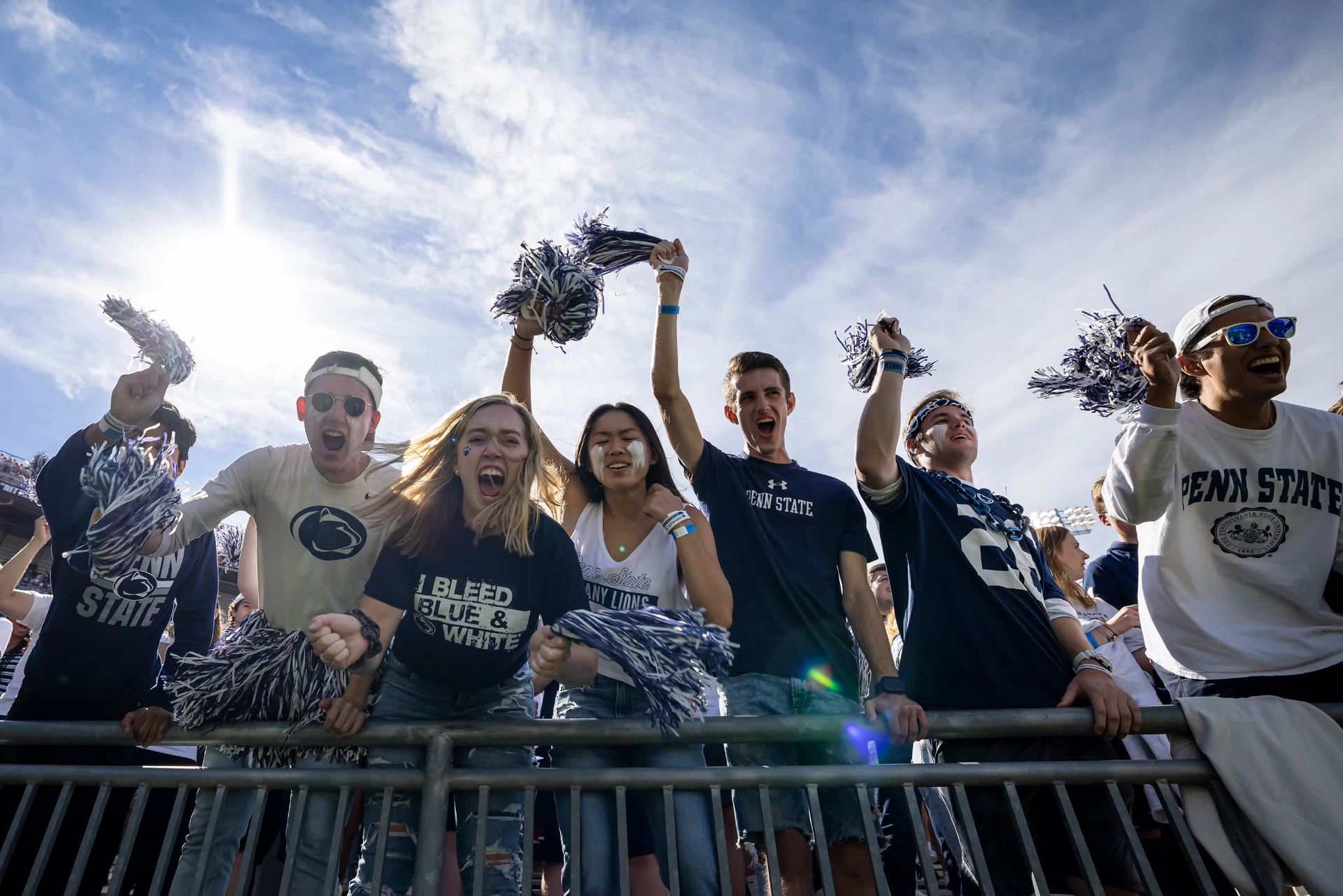 Penn State students cheering at an athletic event